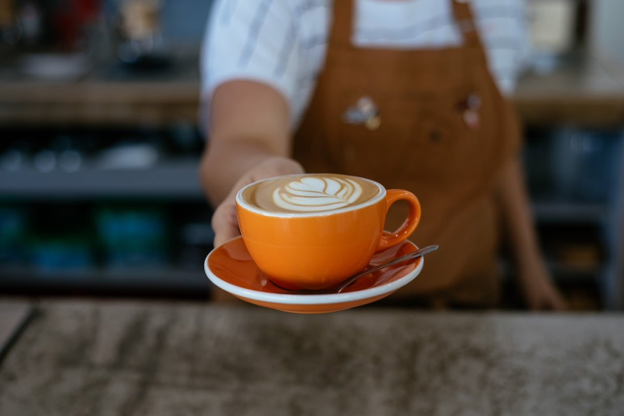 Serving a Latte at The Well Coffeehouse in Nashville